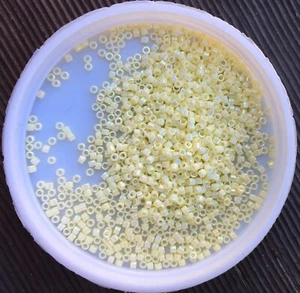 11/0 MIYUKI Seed Beads, Delica, Opaque Pale Yellow AB (DB1501), 5g - Picture 1 of 1