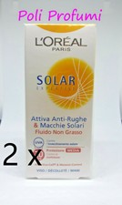 2 x L Oreal solar expertise attiva anti rughe & macchie solari fluido no grasso