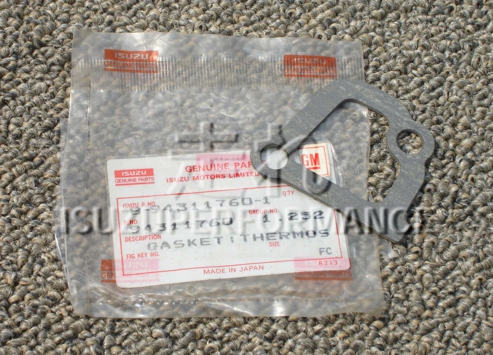 Junta de carcasa Isuzu 8-94311760-1 T-stat 4XE1-SOHC Geo Storm Base, Isuzu Stylus Foto 1 de 1