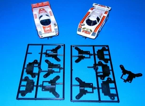 Carrera Profi: Porsche und Ford – altes 4-Schrauben Chassis + Distanzplatten - Bild 1 von 16