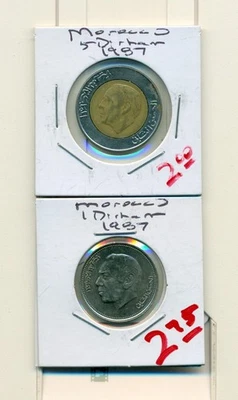 Показать Inv- 2 изящные монеты от Марокко - 1 и 5 дирхам (оба 1987)..5D-это биметаллический - Изображение 1 из 2