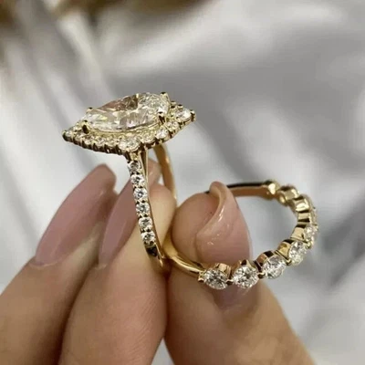 Juego de anillos de boda de moissanita talla pera de 3,5 quilates enchapados en oro amarillo de 14 k Foto 1 de 4