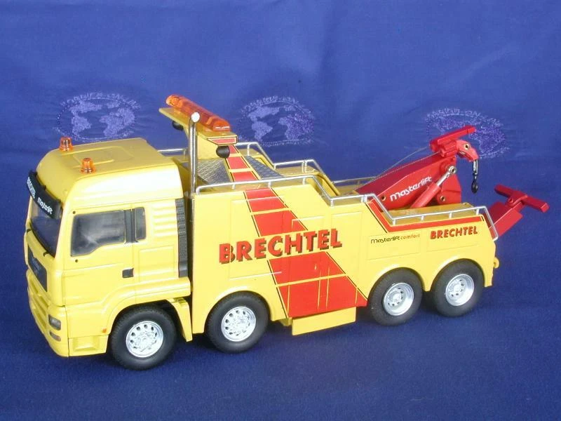 Conrad 66142-02 MAN TGA XXL 4-Axle Wrecker + Telescoping Arm - Brechtel 1/50 MIB - Image 1 of 1