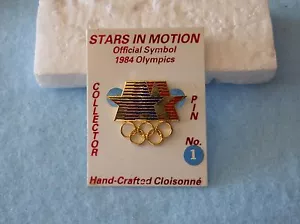 Vintage 1984 Olympische Sommerspiele offizieller Stars-in-Motion Pin auf Originalkarte - Bild 1 von 1