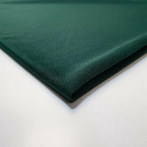 Tela verde botella ITY 4 vías elástica Jersey material spandex 58" metro - Imagen 1 de 3