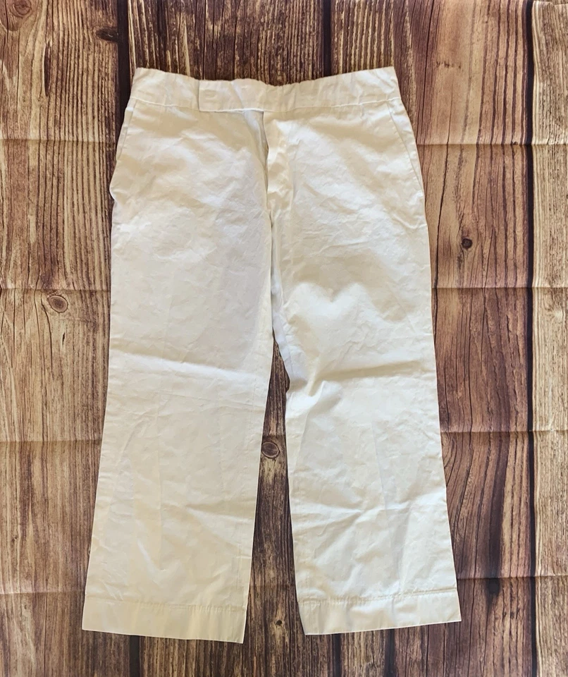 Pantalones de vestir marfil marfil con bolsillos laterales acampanados delanteros planos talla: 44 Foto 1 de 4