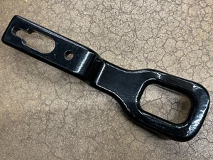 NEW OEM NISSAN FRONTIER 2022-2025 FRONT TOW HOOK (BLACK COLOR) WITH 2 BOLTS - Picture 1 of 3