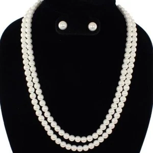 Juego de collar de dos hebras de oro y crema perforadas - Imagen 1 de 1