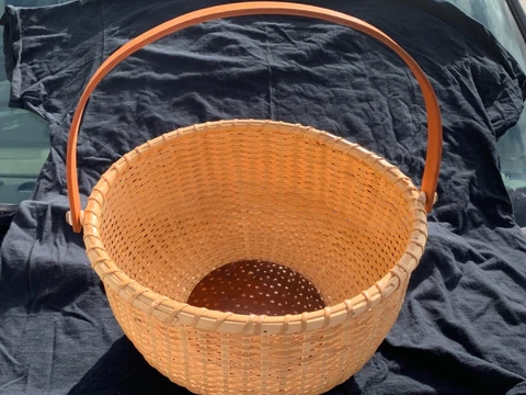 Vintage handmade Nantucket basket with swing handle Cover