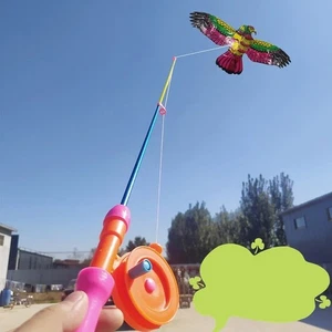Mini cometa de plástico de dibujos animados para niños cometa + caña de pescar de freno de mano de 40 cm al aire libre - Imagen 1 de 18