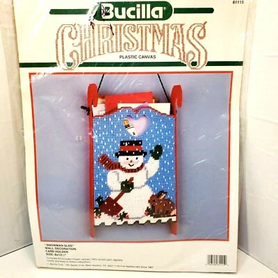 Bucilla Christmas Plastic Canvas Kit Snowman Sled Card Holder Wall Hanger Red - Image 1 of 4