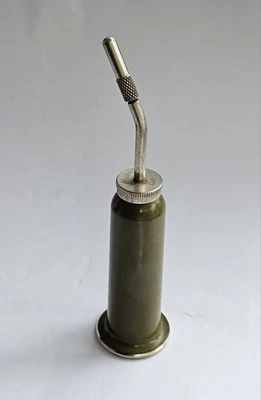 BOMBA DE PULGAR DE ACEITE HUILE VINTAGE ~ LATA DE ENGRASADOR ~ ELNA ~ MÁQUINA DE COSER HECHA EN SUIZA Foto 1 de 4