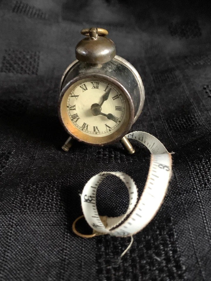 Antique Bedside Alarm Clock Novelty Cast Metal Rotary Tape Measure - Image 1 of 4