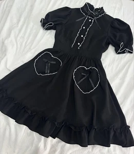 Vestido con bolsillo en corazón En Cluge - Imagen 1 de 4