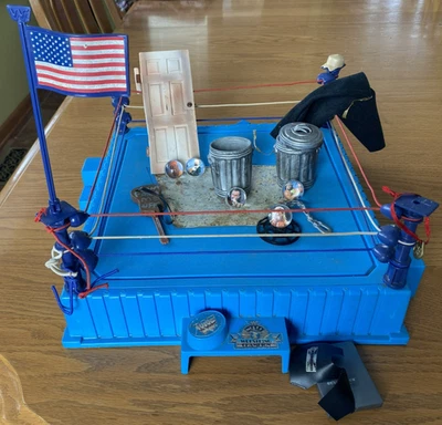 Hasbro WWF Wrestling Ring with flag plus Rad Roller marbles & accessories - Image 1 of 4