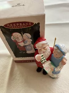 1994 ""A Handwarming Present"" Mr & Mrs Claus Hallmark adorno de recuerdo serie #9" - Imagen 1 de 5