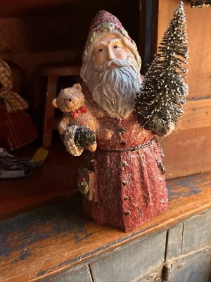 Primitive Santa In Red Coat With Tree And Bear And Sled - Image 1 of 4
