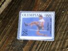 Laminated Usa 25 Cent Olympian Stamp Ray Ewry Pin   Track Field Olympic Rings