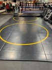 Black wrestling mat 38’ x12’ 3 circles 2 minor blemishes 