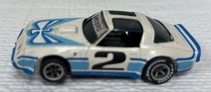 AFX Slot Car Scala HO Pontiac Firebird #2 Bianco/Blu Chiaro Testata Funzionante - Foto 1 di 9