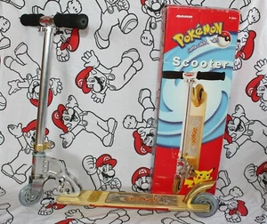 SCOOTER PATINETE NINTENDO RAID POKEMON 2000 GOLD & SILVER OFICIAL BOXED - Picture 1 of 11