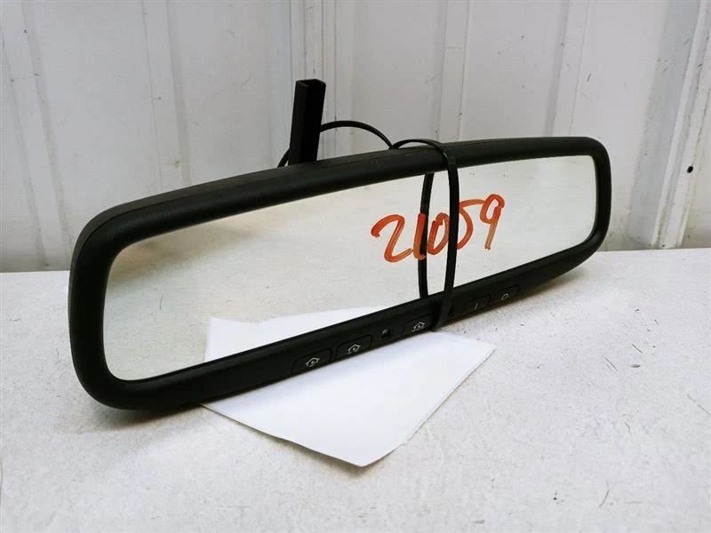Espejo retrovisor Kia Sedona 2006 con abridor de garaje y atenuación OEM usado probado Foto 1 de 4