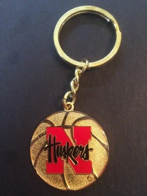 Llavero Nebraska Cornhuskers - Nuevo Oro / Logotipo Huskers - Licencia NCAA Foto 1 de 2