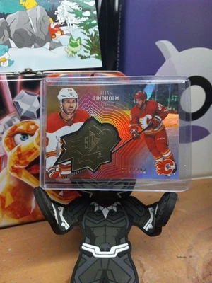 2021-22 Upper Deck Extended Series SPx Finite Radiance /799 Elias Lindholm #SF-7 - Image 1 of 2