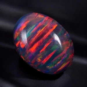 AAA+ Cabujón ovalado de ópalo de fuego negro 14x10 mm 3,32 quilates piedra preciosa suelta australiana - Imagen 1 de 6