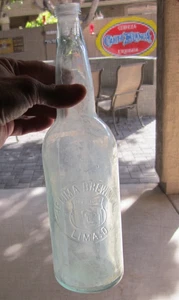 Botella de cerveza grande en relieve 11,5" THE LIMA BREWING Pre Prohibición verde agua - Imagen 1 de 7