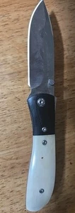 Vintage CRKT M4-02 White bone Light usage. - Picture 1 of 5