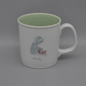 Taza de café vintage 1987 January Girl Precious Moments 10 oz interior verde - Imagen 1 de 10