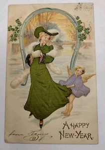 Vintage Postcard Lady and Cherub Ice Skating Silk Clothing Happy New Year - Picture 1 of 3