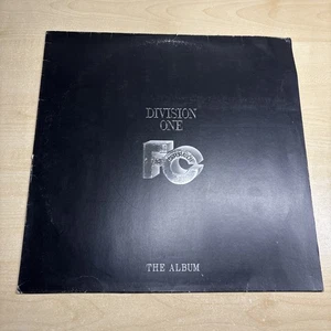 Far Corporation Division One - The Album EMBOSSED COVER IMP Vinyl 12“ LP 1985 - Bild 1 von 16