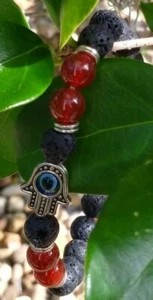 ACEITE ESENCIAL - MAL DE OJO - ELÁSTICO - ROCA DE LAVA NEGRA NATURAL - PULSERA DE PIEDRA - Imagen 1 de 2