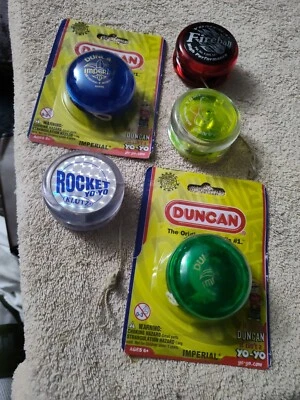YO-YO'S (5) LOT (2) NEW DUNCAN (2) VINTAGE YOMEGA'S (1) KLUTZ - ROCKET - Image 1 of 4