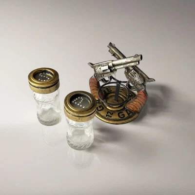 Juego de pistolas cruzadas Western sal pimienta soporte escopeta con agitadores de vidrio Foto 1 de 4