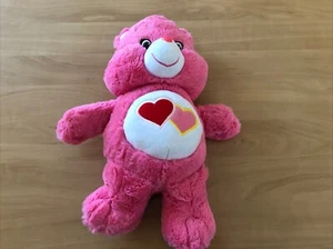 BB/ PELUCHE JEMINI BISOUNOURS CARE BEARS MUSICAL GROSCHERI 2 COEUR ROSE - Imagen 1 de 2