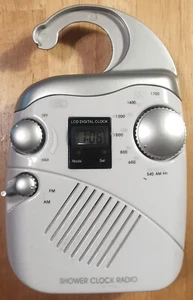AM/FM Shower Clock Radio; silver over white; needs 4 AA Batteries; WORKS!! - Picture 1 of 6