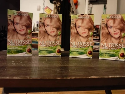 (Lote de 4) Tinte para cabello rubio nacarado Garnier Nutrisse Nurishing Ultra Creme #82 Foto 1 de 2