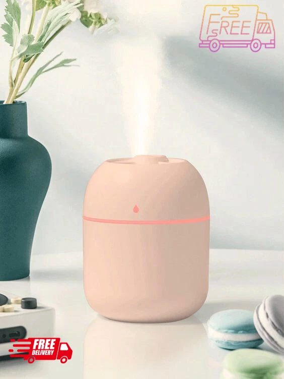 Humidificador ABS, moderno atomizador de escritorio rosa dispositivo hidratante para el hogar Foto 1 de 1