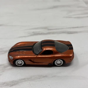Johnny Lightning Dodge Viper SRT10 Copper Orange Metallic/Black Stripes 1:64 NM - Picture 1 of 10