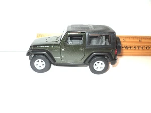 Welly Jeep Wrangler Rubicon Hardtop 2007 schwarz Pull-Back, Türen öffnen 1:64 Defekt - Bild 1 von 6