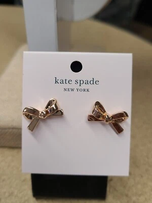 Pendientes Kate Spade tono oro rosa mini lazo ajustados tachuelas Foto 1 de 2