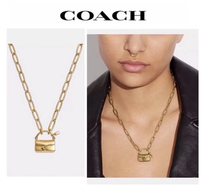 NUEVO CON ETIQUETAS Coach MINI BOLSO ATIGRADO ENCANTO Tono Dorado Latón Colgante Cadena Collar Foto 1 de 4