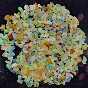 Lote de 100 piezas AAA ópalo etíope áspero Welo ópalo fuego ópalo natural multiflash piedra preciosa - Imagen 1 de 6