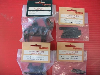 Kyosho Vintage Raider 2WD Parts Assortment -- 4 Pieces NOS - Image 1 of 4