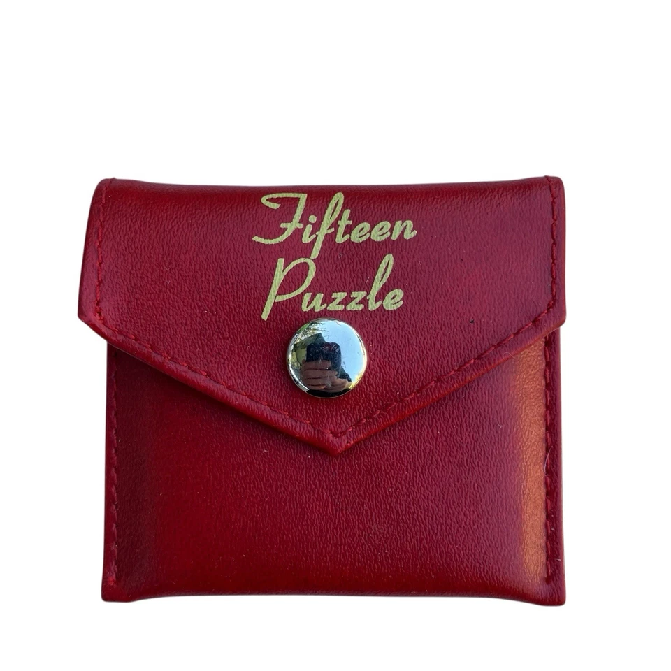 Juego clásico rompecabezas ThinkFun Fifteen con estuche de viaje rojo bolsillo de acero inoxidable Foto 1 de 4