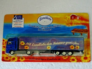 CAMION SEMI-REMORQUE PUBLICITAIRE NEUF SOUS BLISTER   ÉCHELLE HO   N°49 - Picture 1 of 2