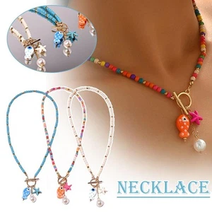Bohemian Sea-Inspired Ceramic Spotted Fish & Starfish Pendant Necklace`,. - Picture 1 of 18